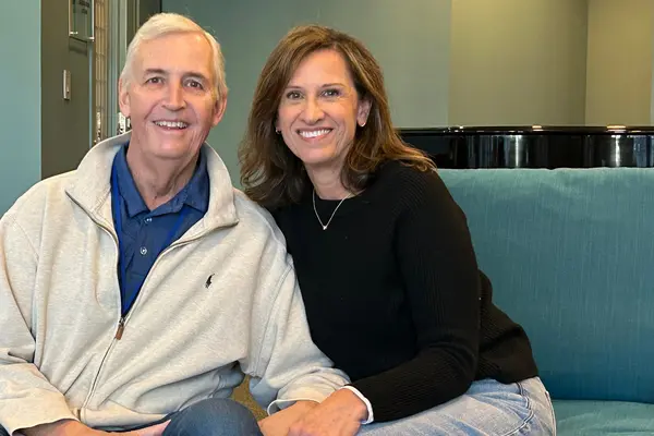 MSK treated Steve Harrold, sitting with his wife, Sara, for throat cancer. 