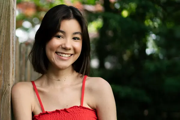 Giovanna Whitting, pictured smiling outdoors, took an experimental drug at MSK that cured aggressive thyroid cancer. 