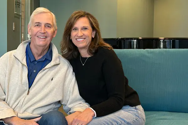 MSK treated Steve Harrold, sitting with his wife, Sara, for throat cancer. 