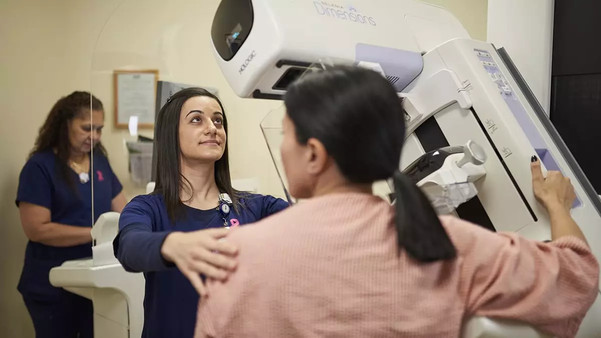 Woman receiving a mammogram