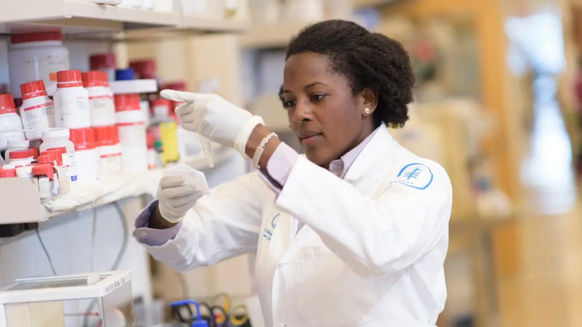A scientist working in the lab at ZRC