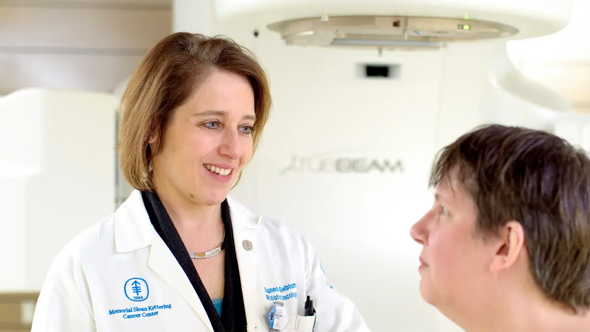 Radiation oncologist Dr. Daphna Y. Gelblum, Director, Regional Radiation Oncology Clinical Research, talks with her patient.  