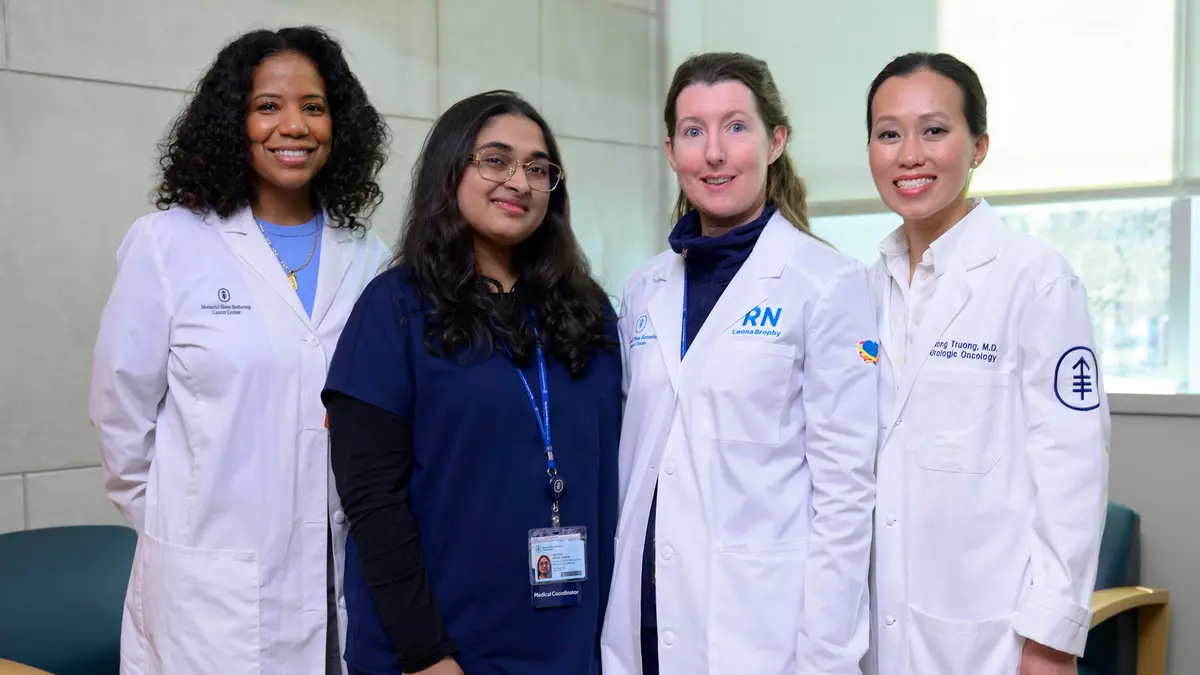Four women on MSK’s prostate cancer care team standing together. 
