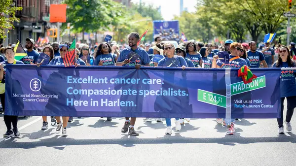 MSK staffers participate in the African American Day parade.